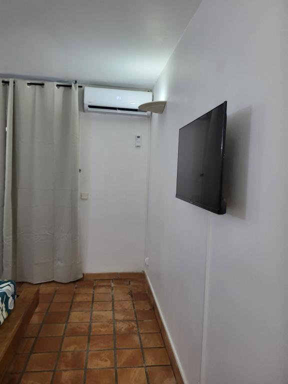 TV a/nebo společenská místnost v ubytování Serenity Tartane