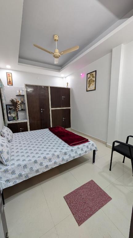 Voodi või voodid majutusasutuse Krishnaalay Guest House toas