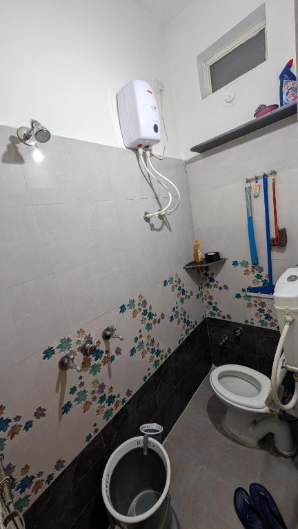 Vannituba majutusasutuses Krishnaalay Guest House