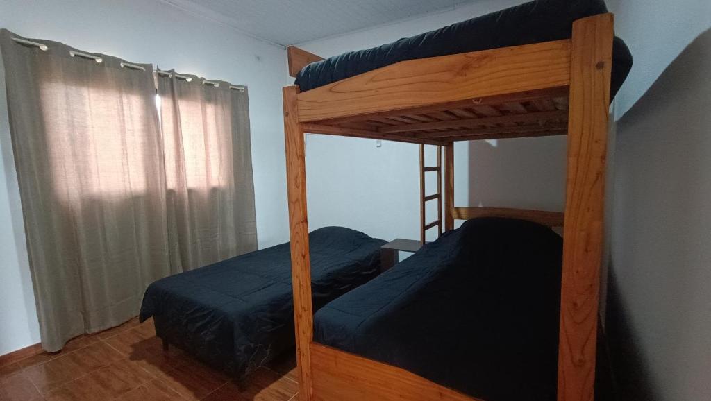 Ένα ή περισσότερα κρεβάτια σε δωμάτιο στο El Rincón del Cielo