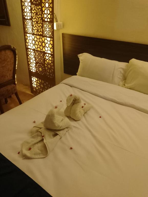 Postel nebo postele na pokoji v ubytování Sofia Guest House