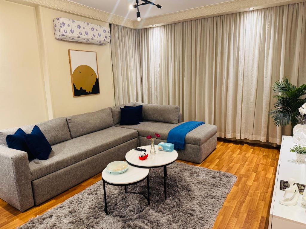 Posezení v ubytování Mokattem private Condo