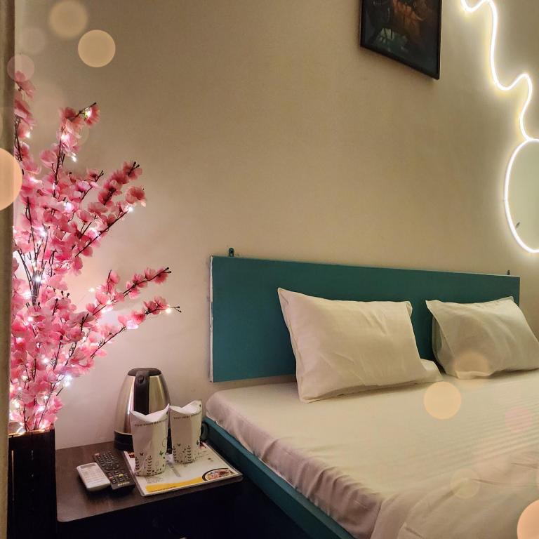 Postel nebo postele na pokoji v ubytování Kasha Homestay