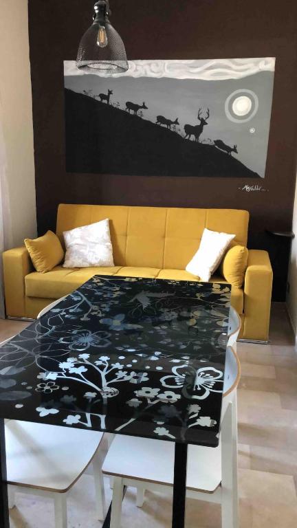 Posezení v ubytování La luce dell'Est Appartamento in villa