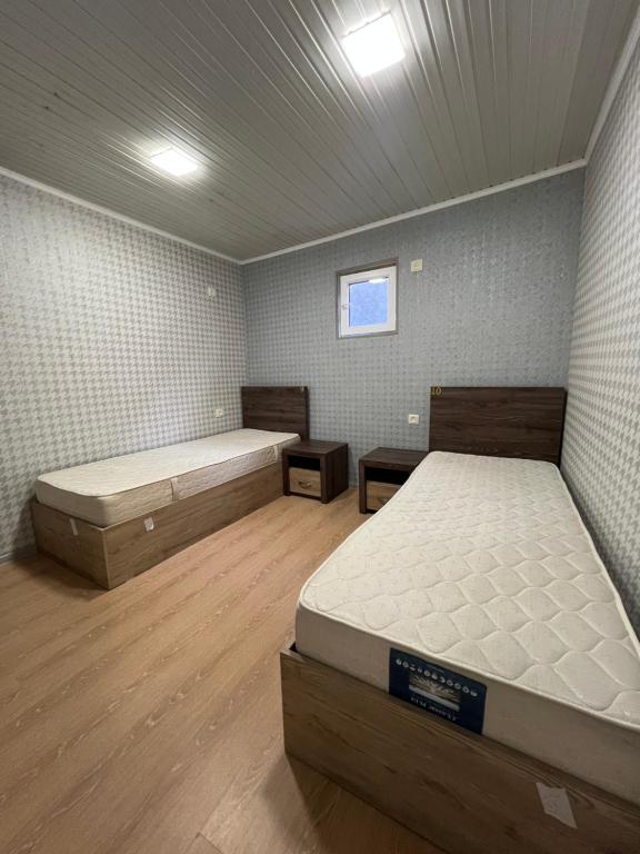 Postel nebo postele na pokoji v ubytování Canyon Hostel City Center
