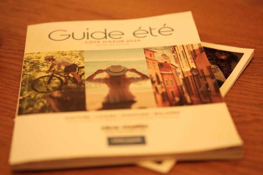 a book sitting on top of a table at CHEZ TAMARA in Nice