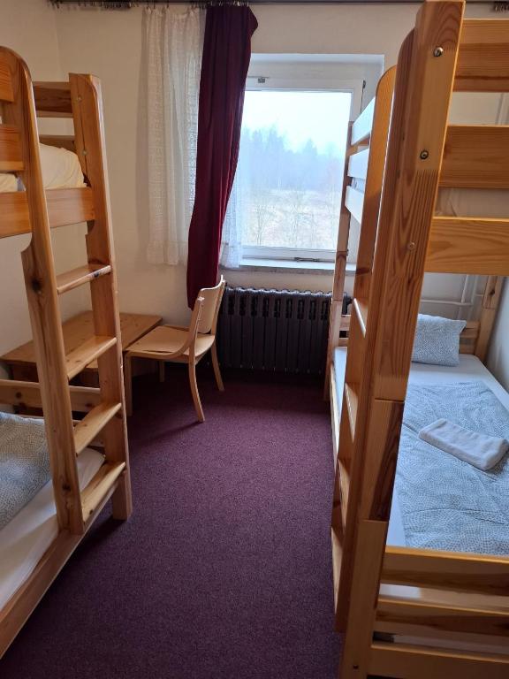 Postel nebo postele na pokoji v ubytování Ferienheim Sorgenfrei