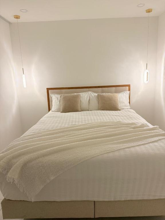 Postel nebo postele na pokoji v ubytování Luxrem Apartments 4