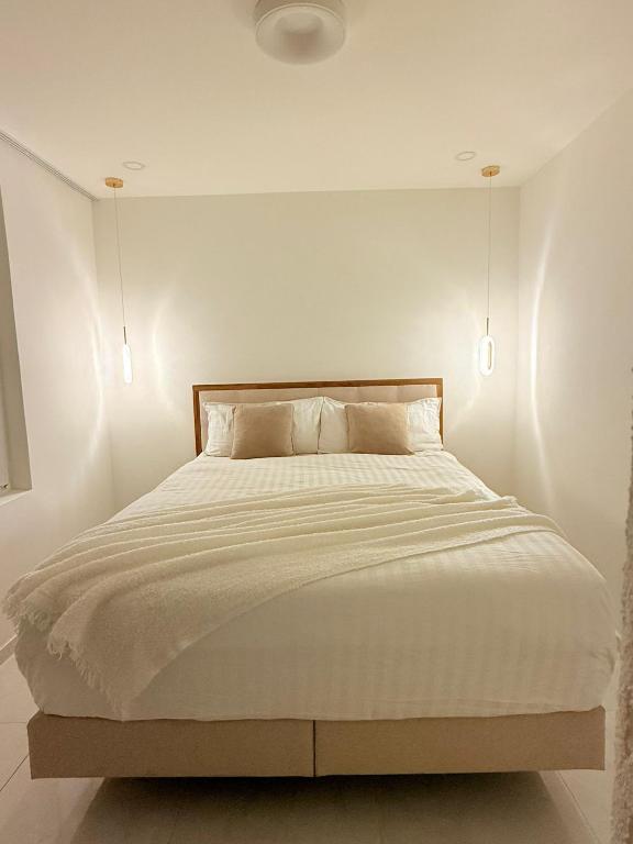 Postel nebo postele na pokoji v ubytování Luxrem Apartments 4