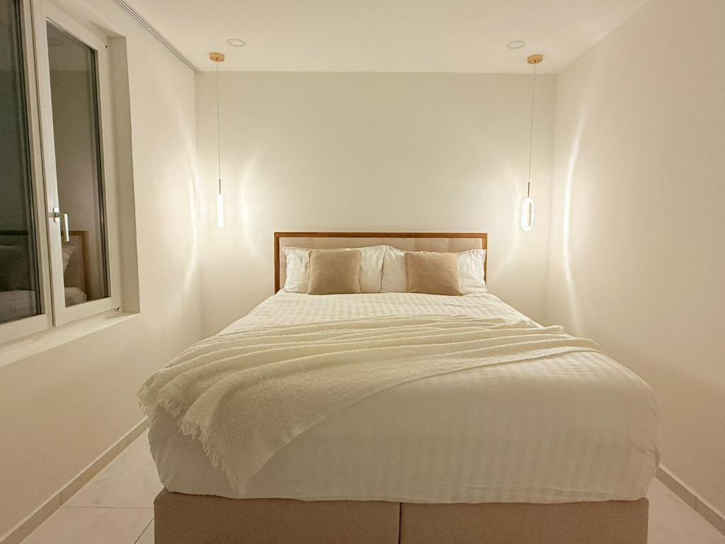 Postel nebo postele na pokoji v ubytování Luxrem Apartments 4
