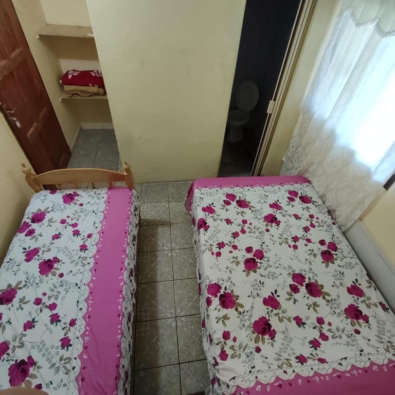 Postel nebo postele na pokoji v ubytování Posada las Mercedes