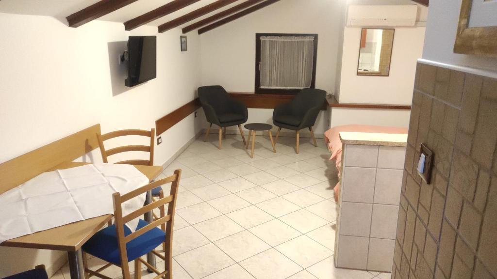 TV a/nebo společenská místnost v ubytování Apartmani Kolenko Rovinj