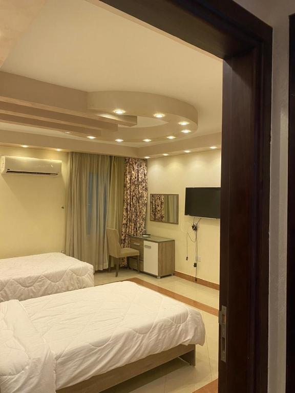 Ένα ή περισσότερα κρεβάτια σε δωμάτιο στο Z m apartment hotel