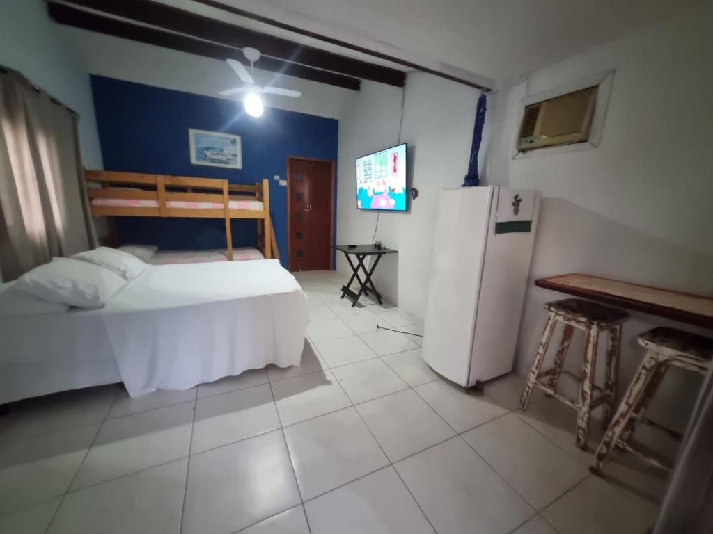 Cama ou camas em um quarto em Pousada Brilho De Paraty
