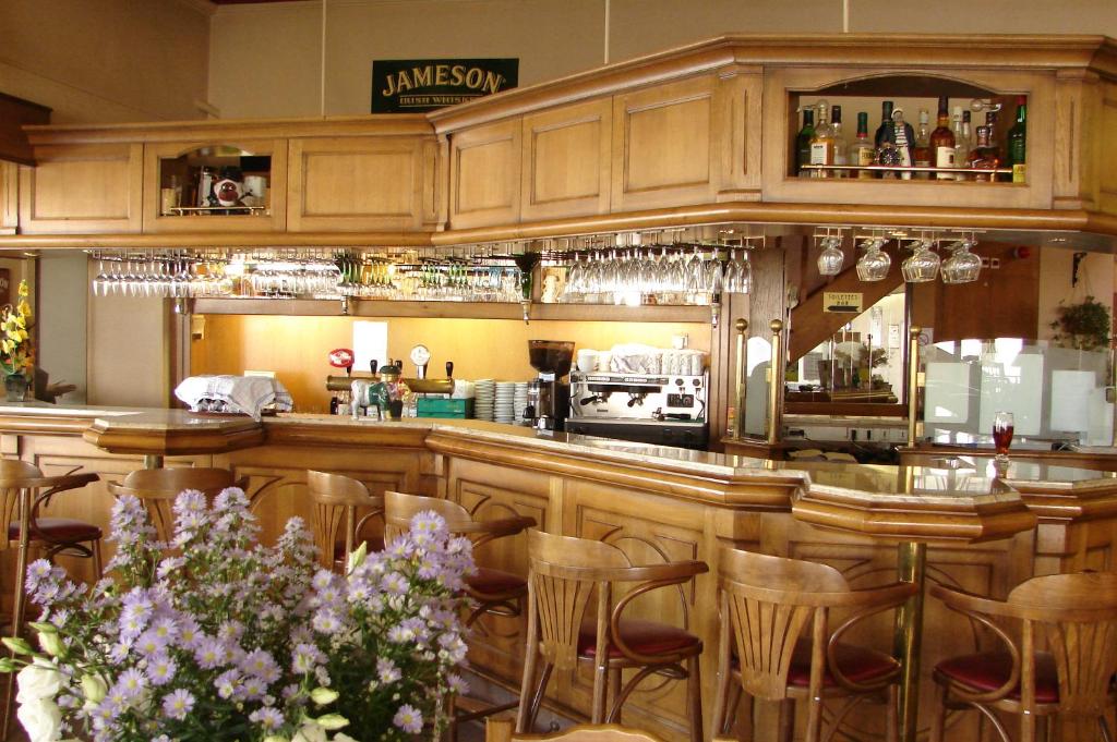 Kuchyň nebo kuchyňský kout v ubytování Hotel Spa Le Relais Des Moines