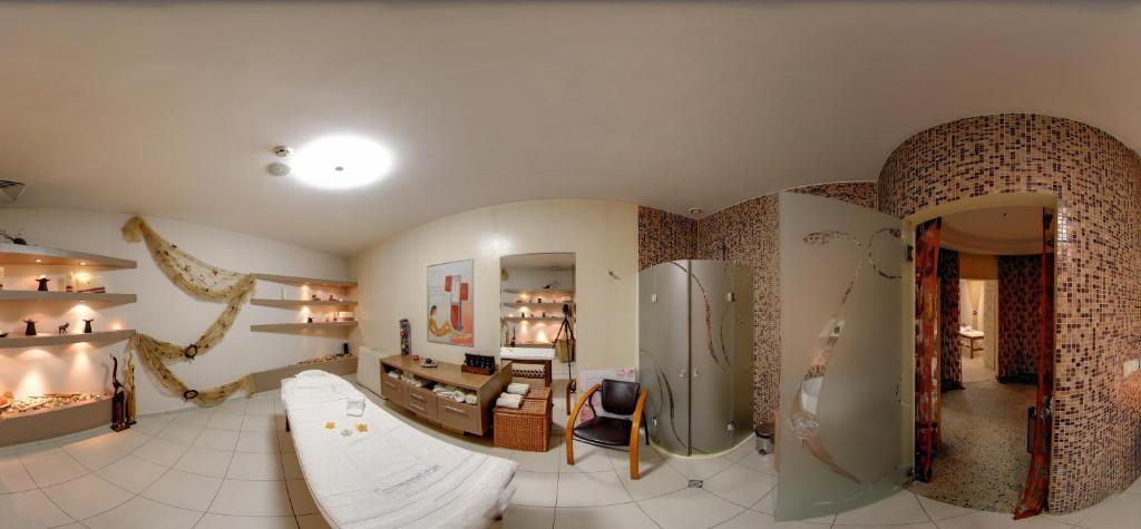 Posezení v ubytování Cosmopolitan Hotel & Wellness