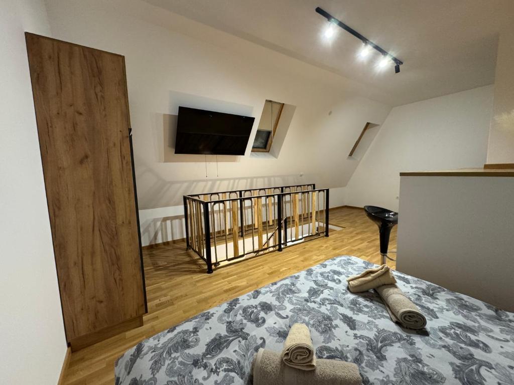 Una cama o camas en una habitación de Divčibora