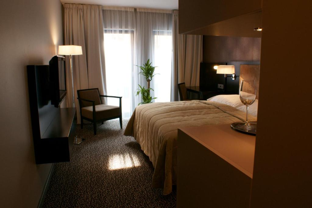 Postel nebo postele na pokoji v ubytování Hotel Avance