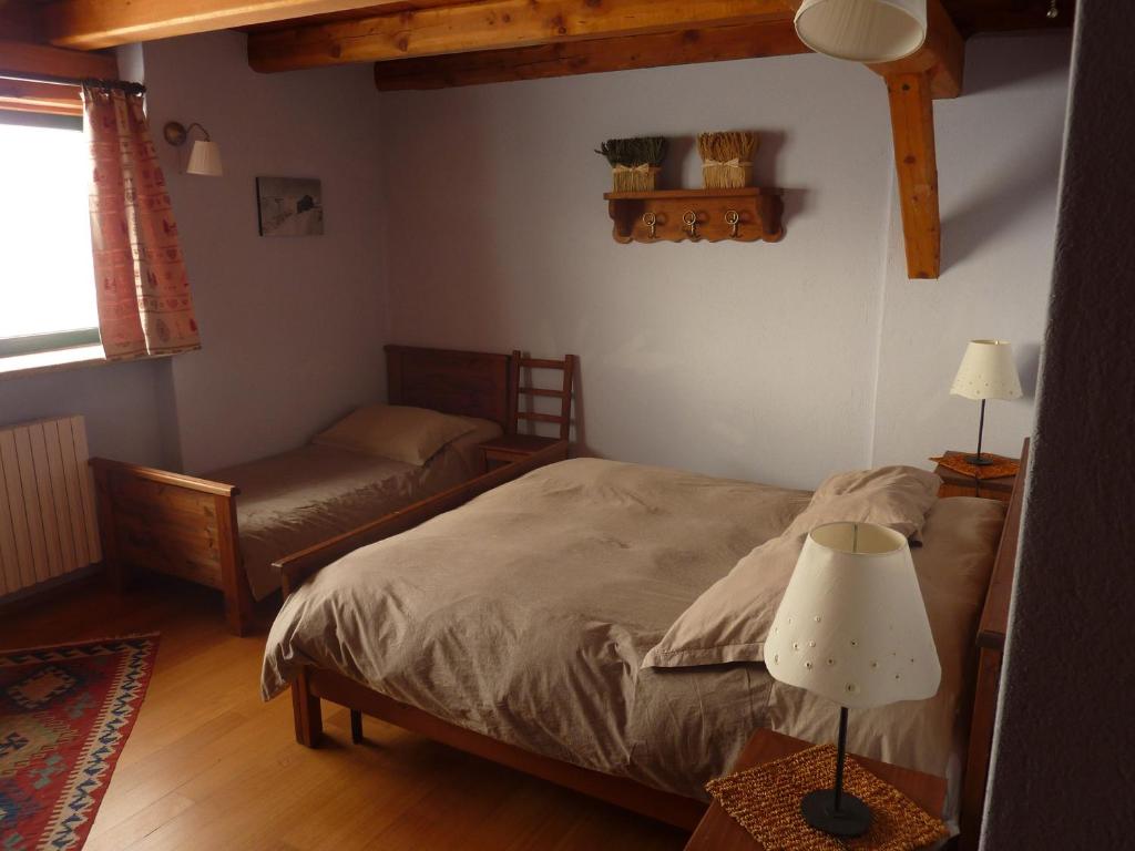 Postel nebo postele na pokoji v ubytování Tana Della Volpe