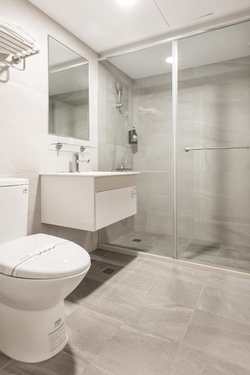 Koupelna v ubytování Mu Chen Hotel