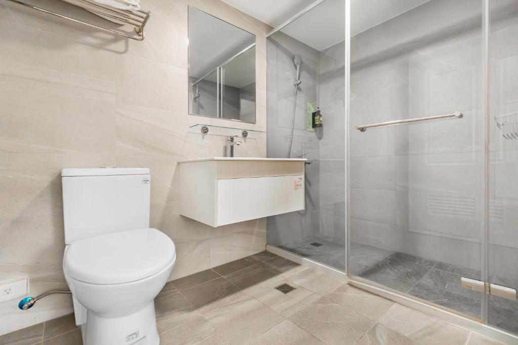 Koupelna v ubytování Mu Chen Hotel