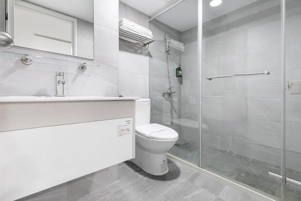 Koupelna v ubytování Mu Chen Hotel