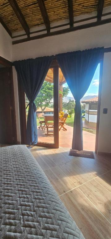 Postel nebo postele na pokoji v ubytování Cabañas Villa Celeste