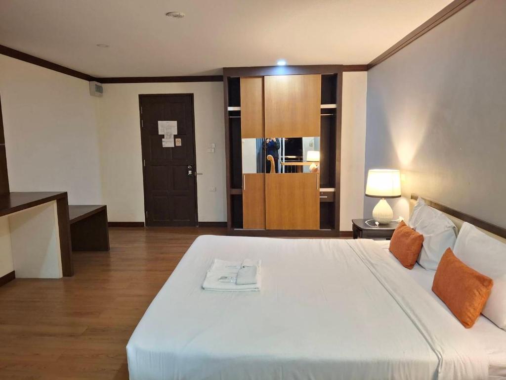 Postel nebo postele na pokoji v ubytování The Villa Chiangrai