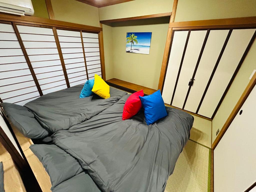 広島Riverside house第2ひまわり201号室にあるベッド