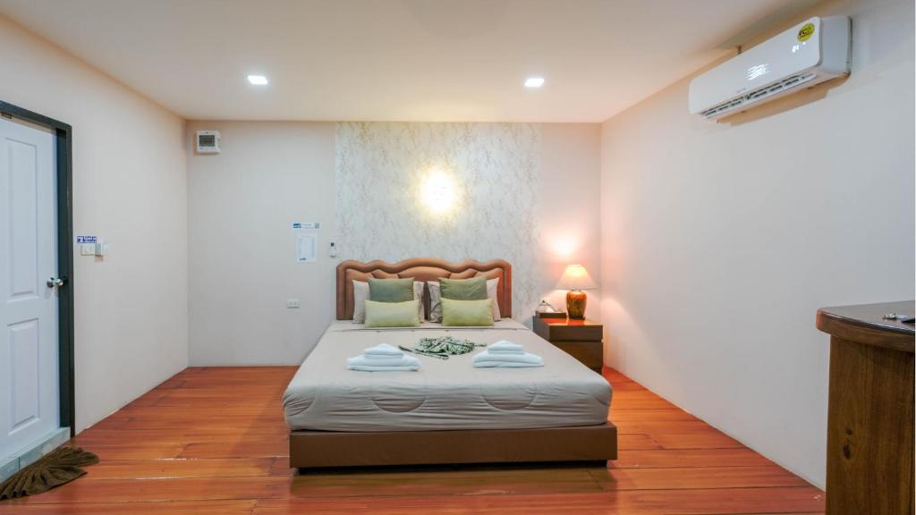 Postel nebo postele na pokoji v ubytování So View Phuket Resort