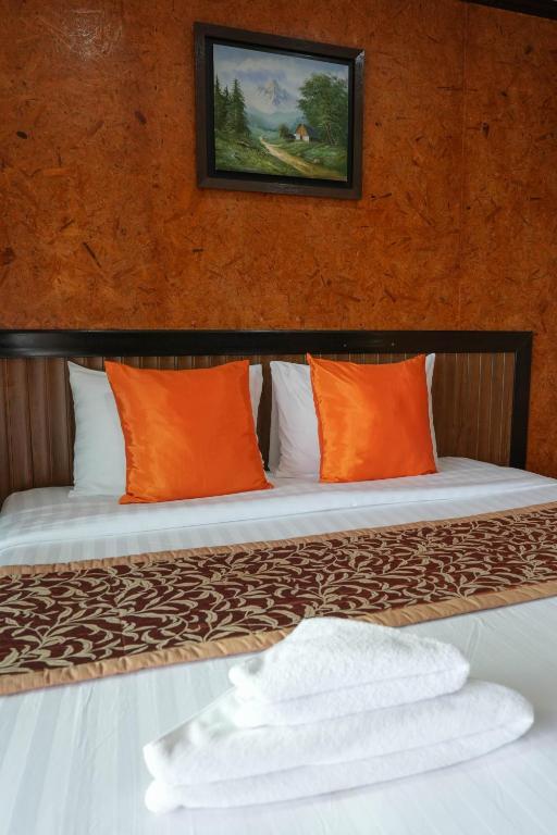 Postel nebo postele na pokoji v ubytování So View Phuket Resort