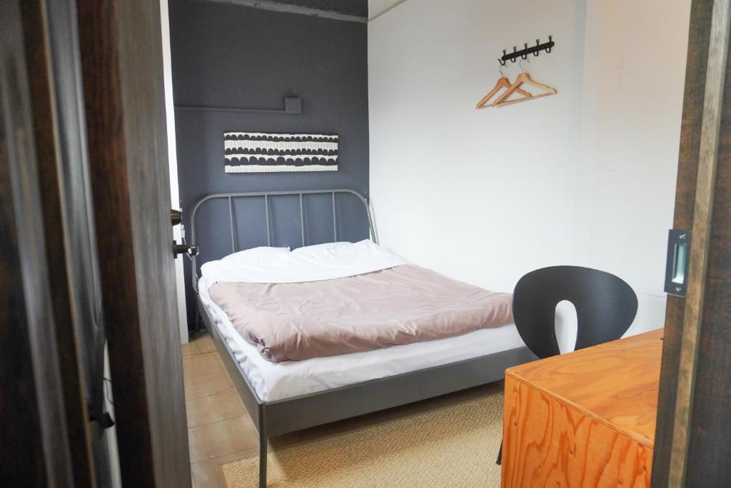 Postel nebo postele na pokoji v ubytování Hostel Niniroom