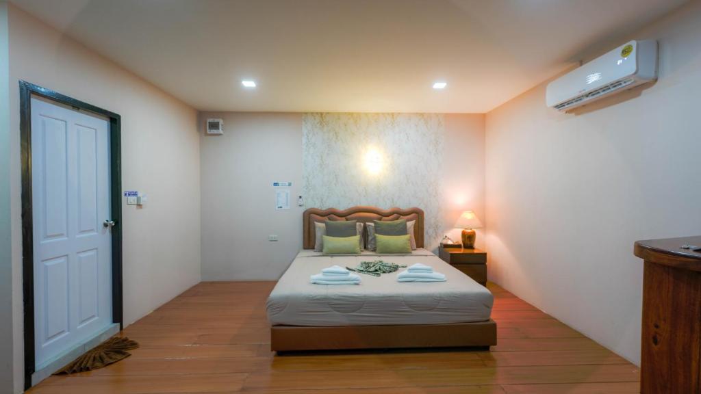 Postel nebo postele na pokoji v ubytování So View Phuket Resort