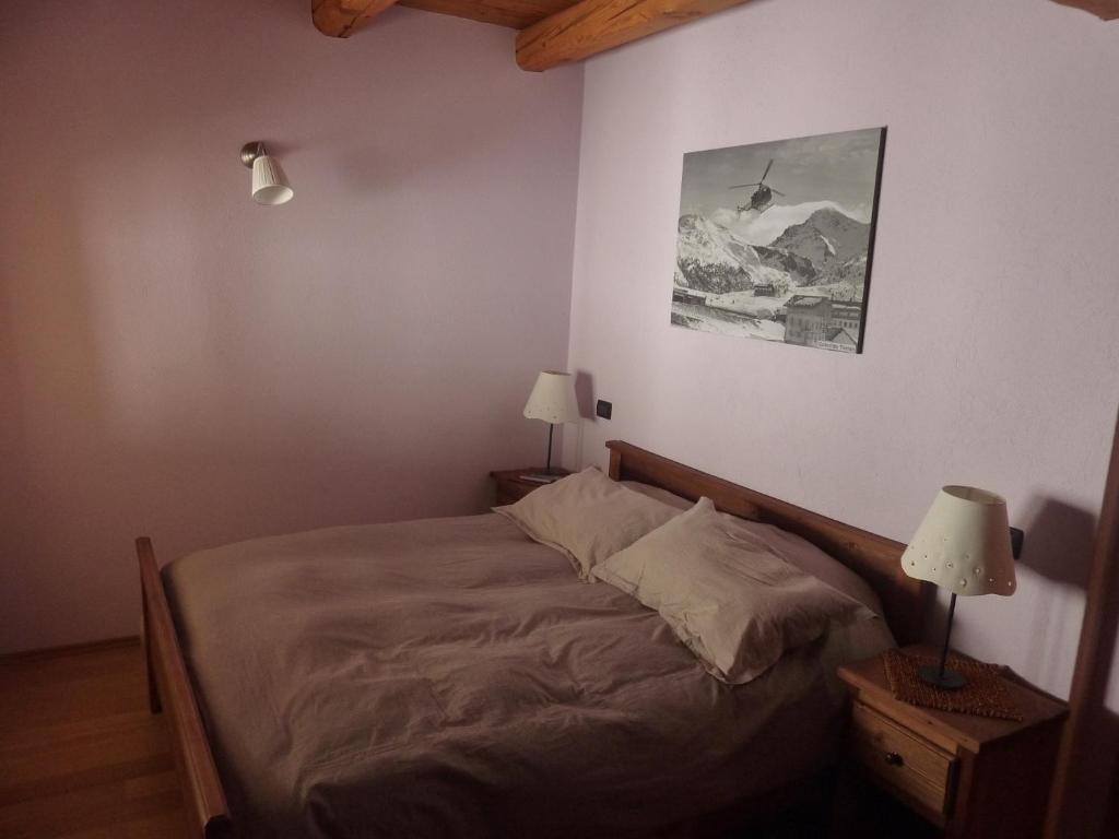Postel nebo postele na pokoji v ubytování Tana Della Volpe