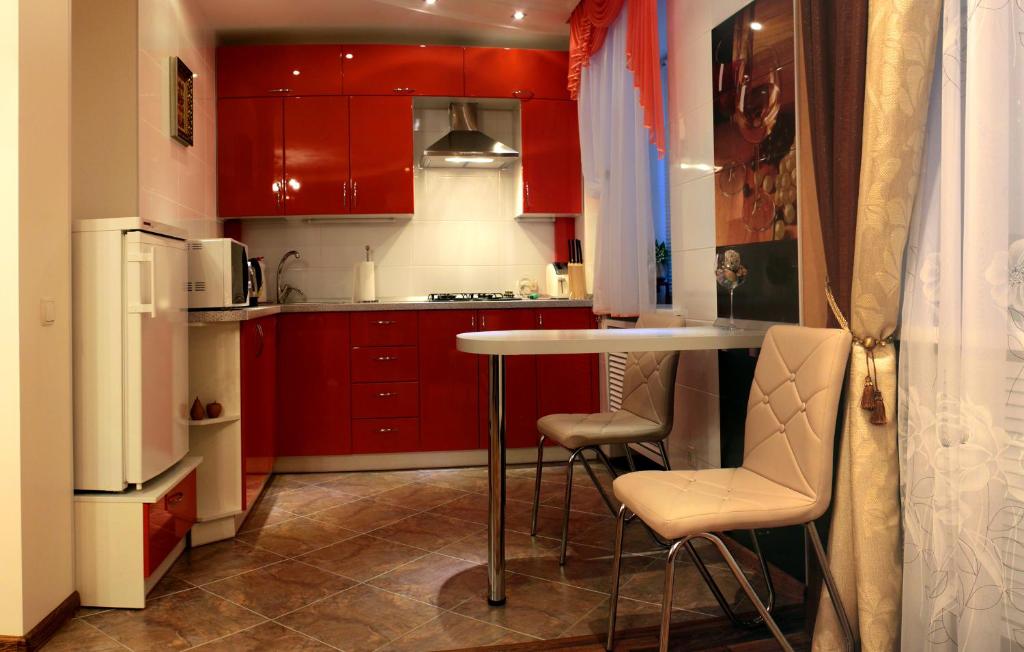 A kitchen or kitchenette at Welcome to Poltava Apartments