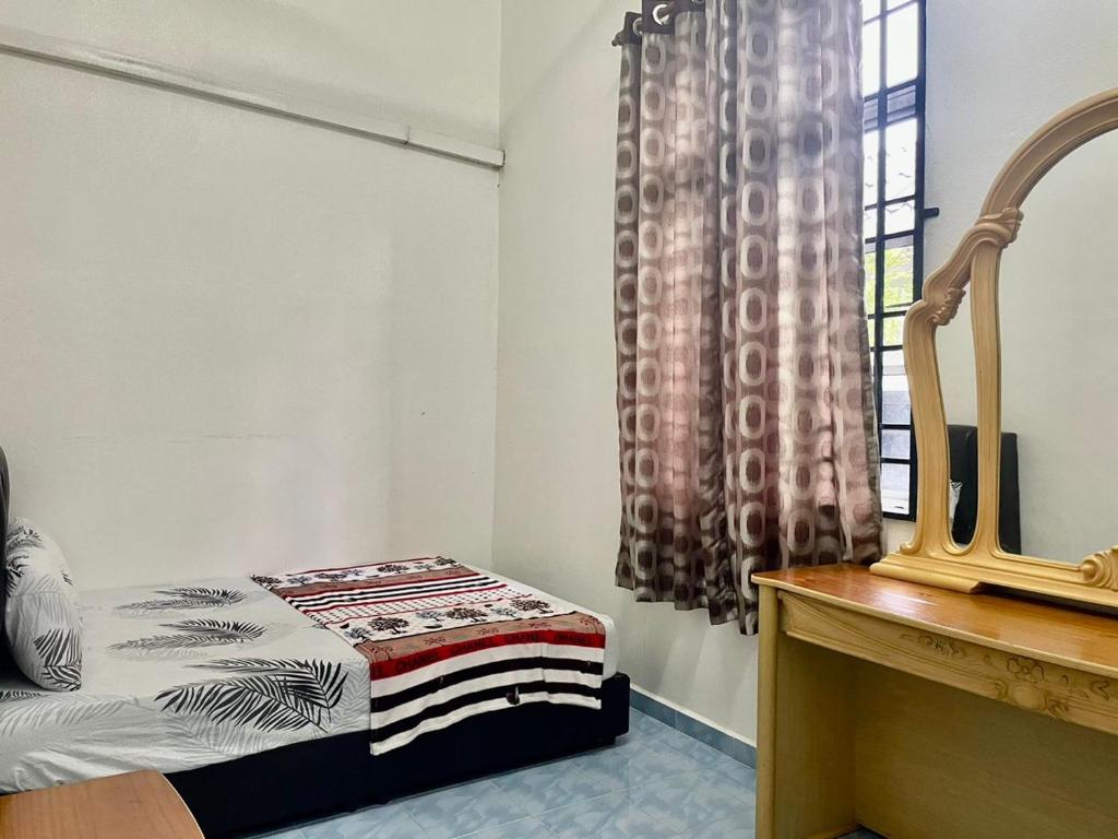 Postel nebo postele na pokoji v ubytování Dz Residence Tunjong
