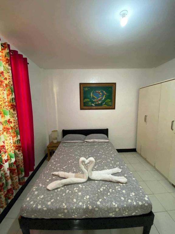 Postel nebo postele na pokoji v ubytování Andresas Homestay