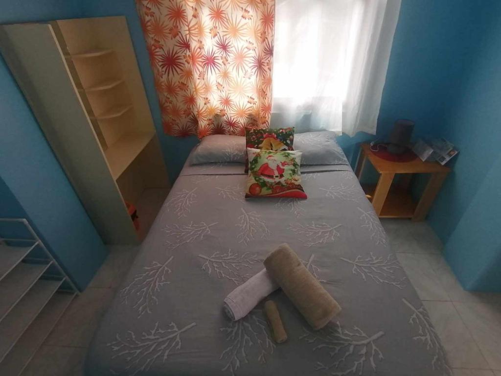 Postel nebo postele na pokoji v ubytování Andresas Homestay