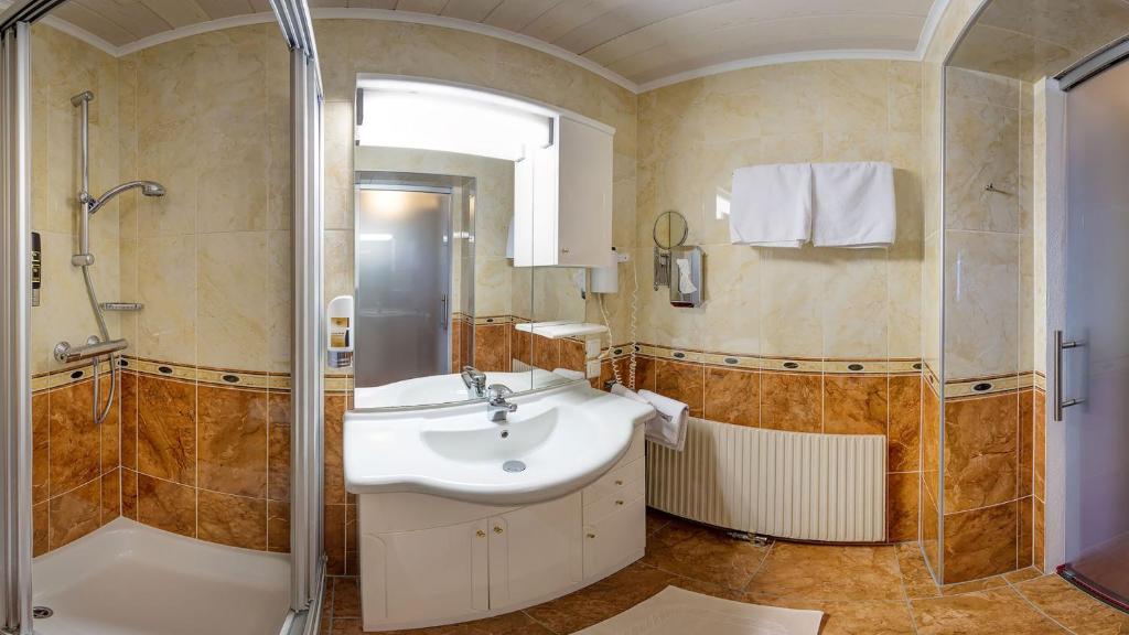 Kúpeľňa v ubytovaní Hotel-Pension Egger