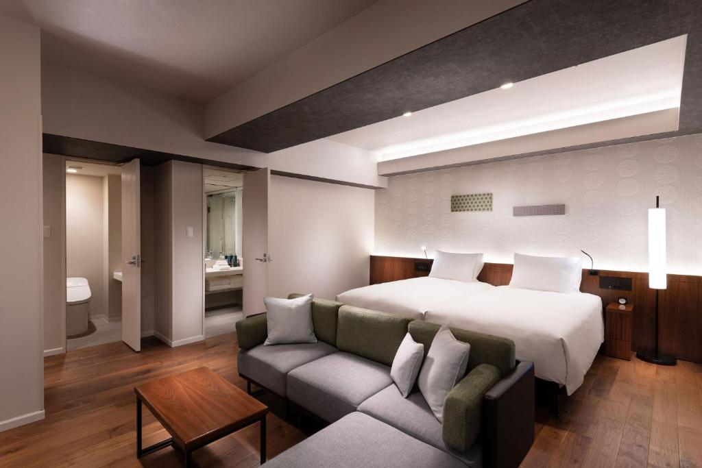 Postel nebo postele na pokoji v ubytování DoubleTree by Hilton Tokyo Ariake