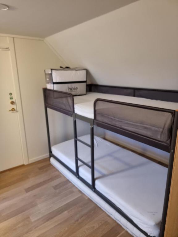Postel nebo postele na pokoji v ubytování Haugvangen
