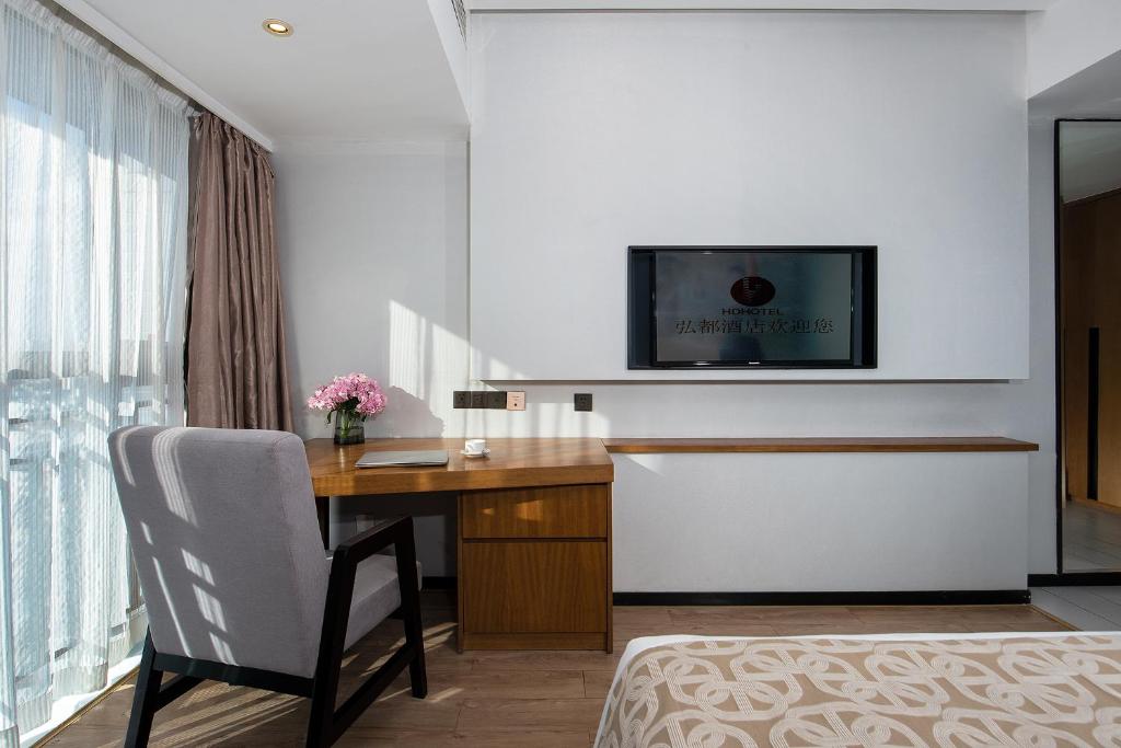 TV a/nebo společenská místnost v ubytování Hongdu Hotel