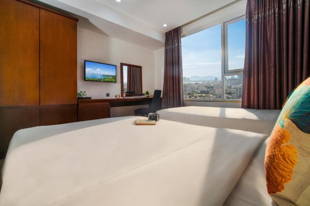 TV a/nebo společenská místnost v ubytování Crystal hotel by Ha My