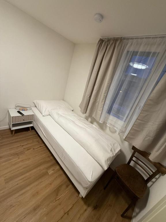 Una cama o camas en una habitación de Feldeck