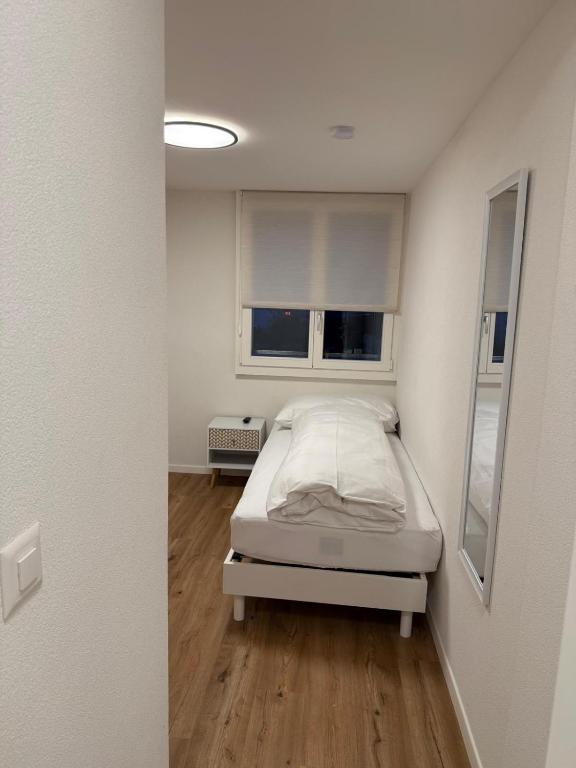 Una cama o camas en una habitación de Feldeck