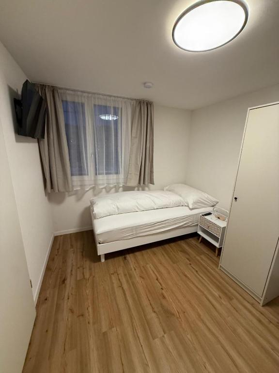 Una cama o camas en una habitación de Feldeck