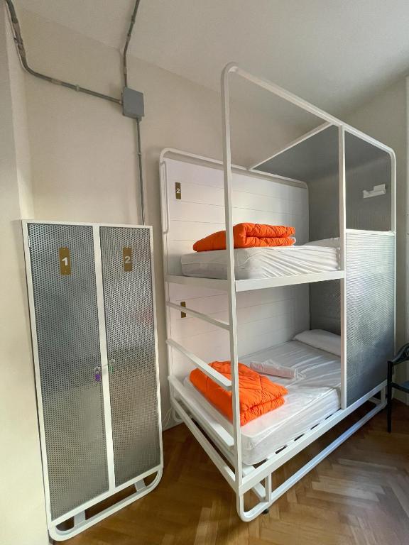 Postel nebo postele na pokoji v ubytování Casali Hostel