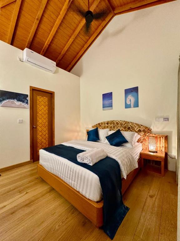Postel nebo postele na pokoji v ubytování Rattehi Inn at Rakeedhoo