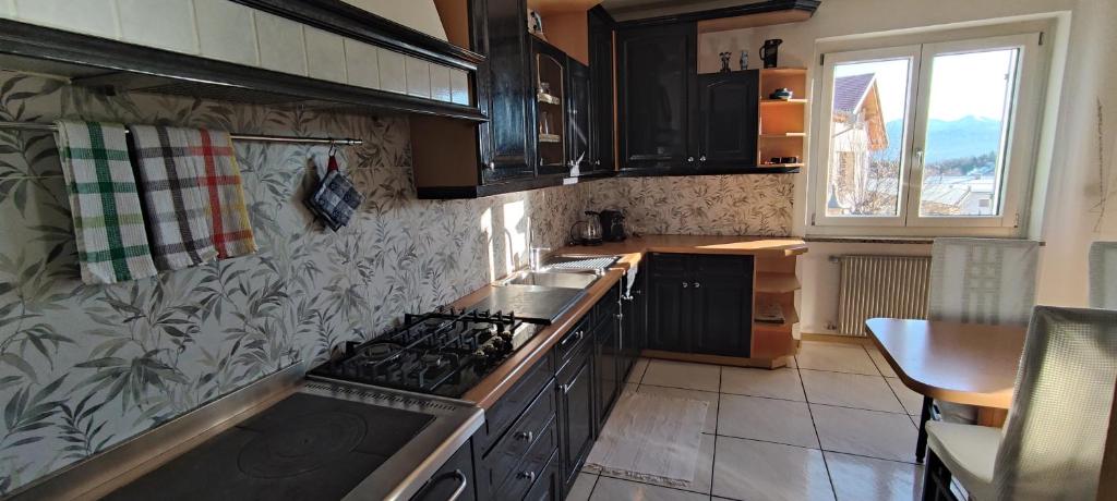 Kuchyň nebo kuchyňský kout v ubytování Apartments Giovannini