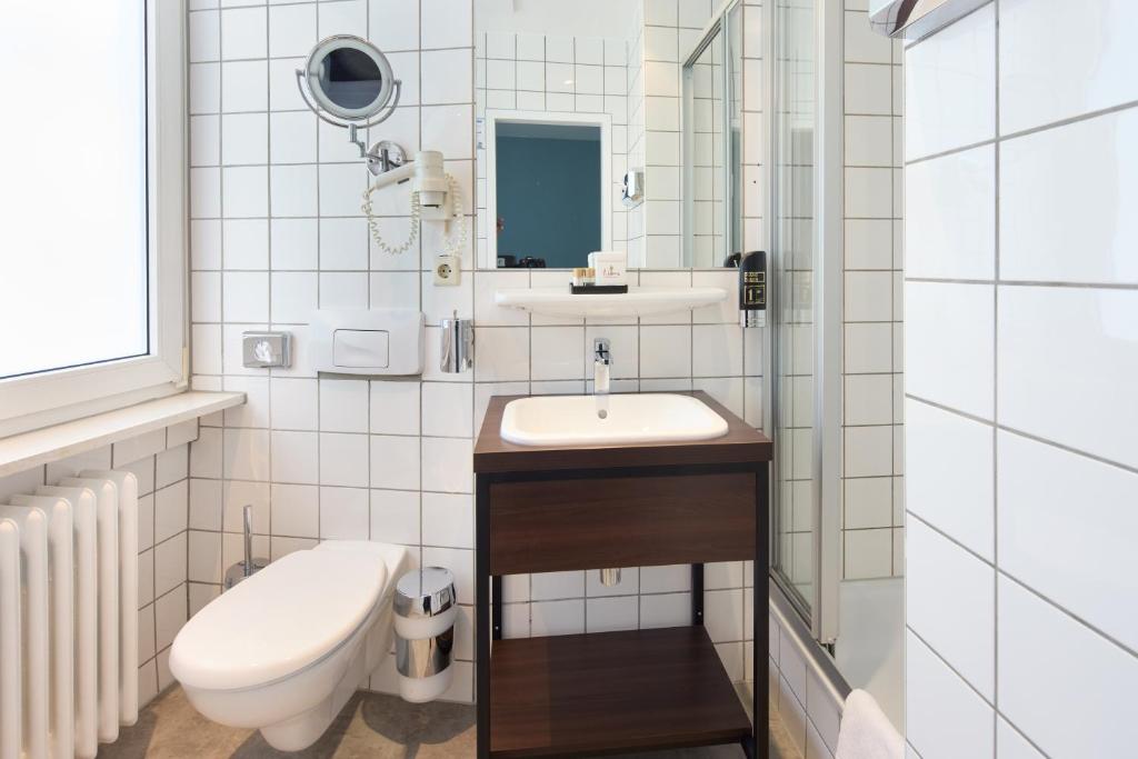 Um banheiro em Trip Inn Hotel Messe Westend